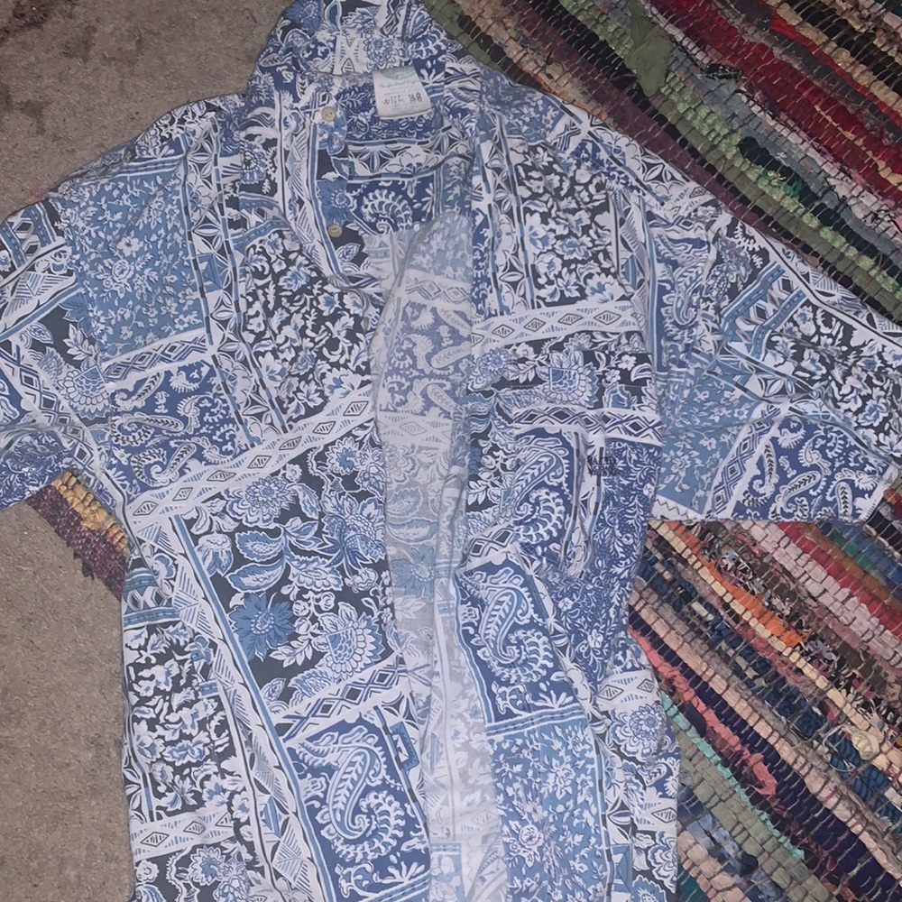 blue and white patterned blouse